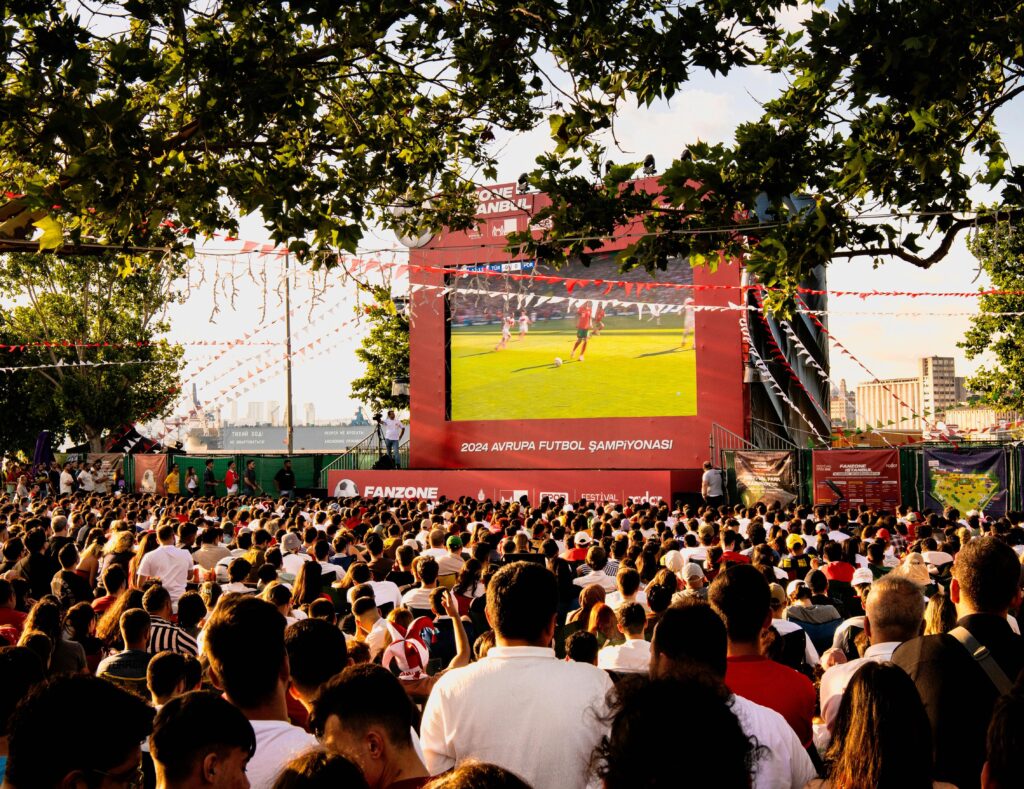 Fan viewing zone watching a match